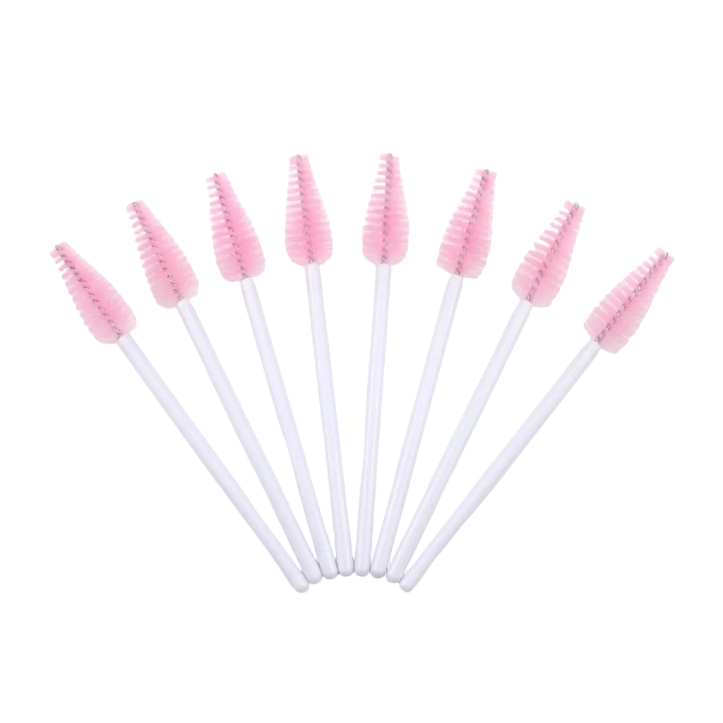 Seven spoolie and brow brushes arranged in a fan shape on a plain white background. The handles are in pastel lavender, white, pink, and black, with the bristles also in pink and black.