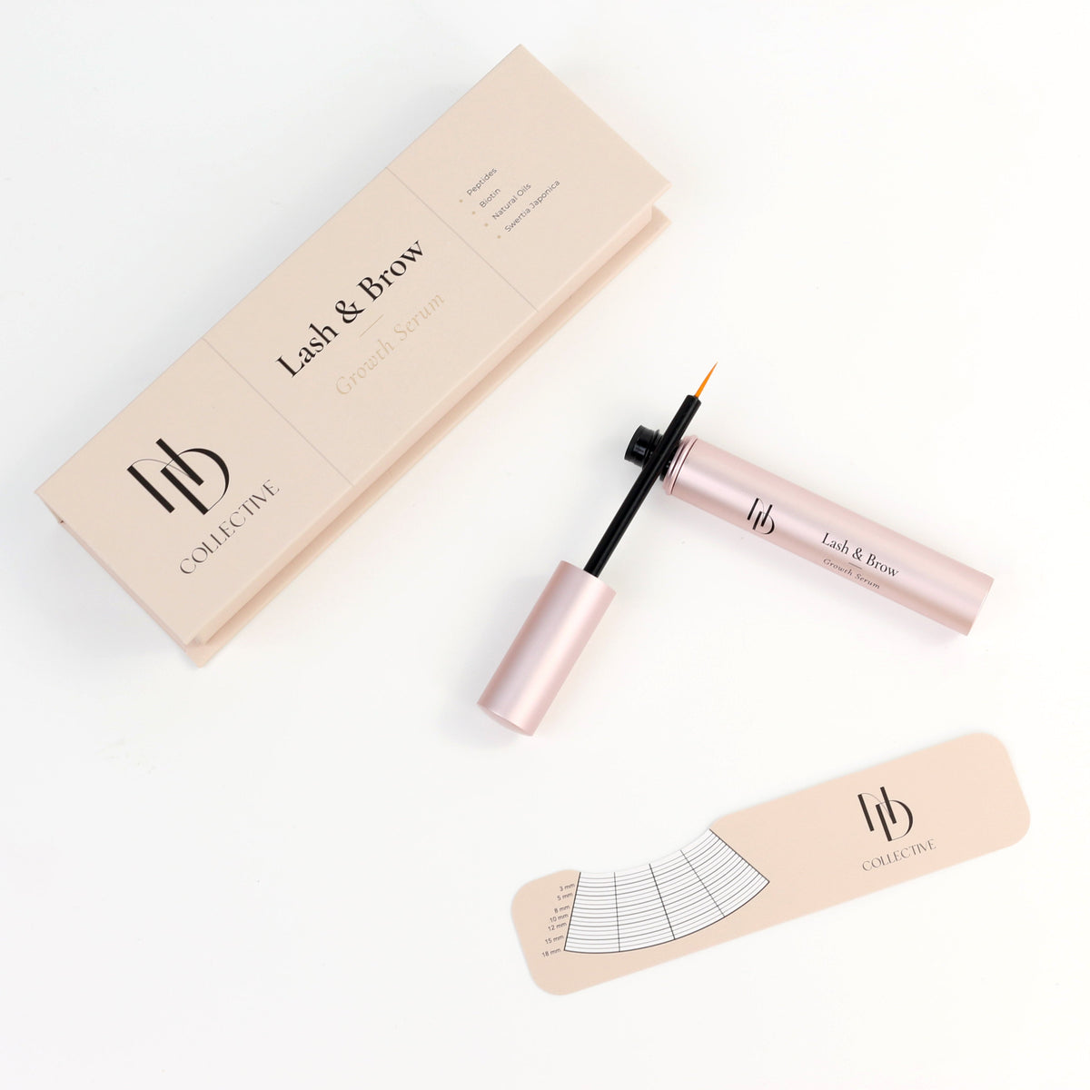A beauty set from HB Cosmetics on a white background, including a 'Lash & Brow' eyeliner pen with its cap off, a matching beige product box, and a beige fan-shaped brow training card.